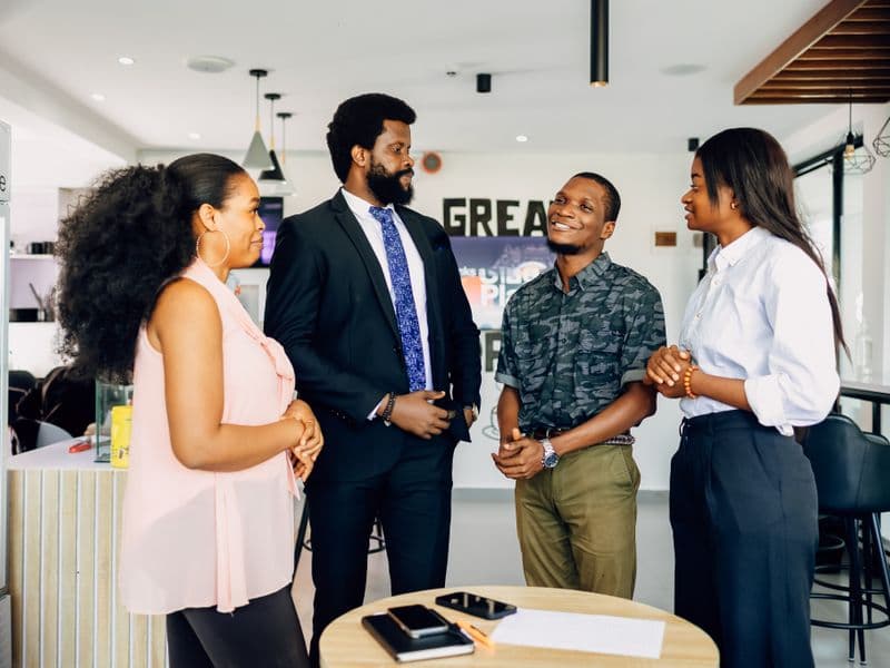 Small team talking in a Lagos office