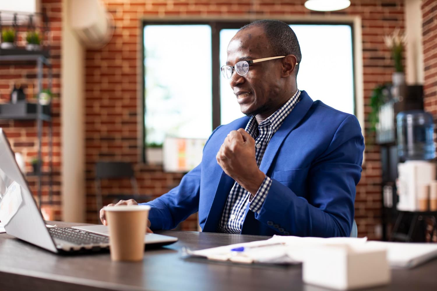 African business owner reviewing his live campaign results