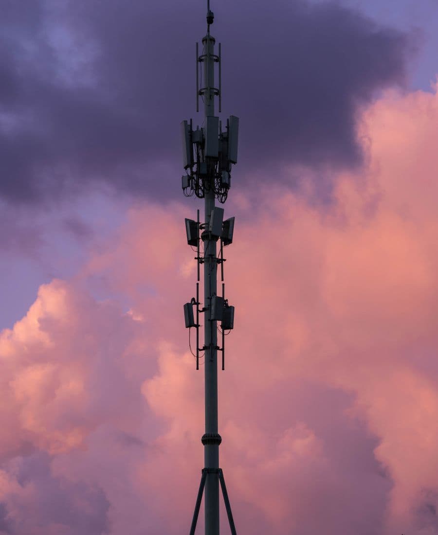Mobile network tower at dusk